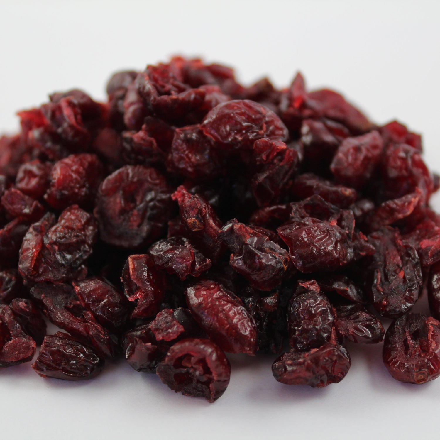 Dried cranberries on a white background