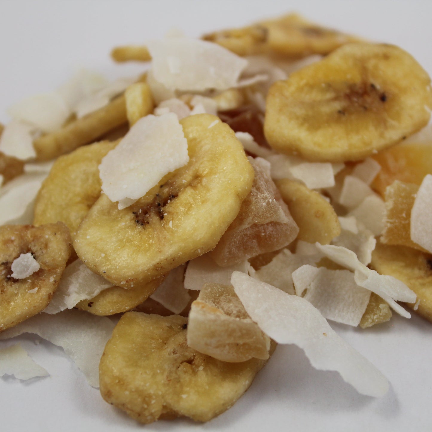 Dried banana slices with coconut flakes and other dried fruits