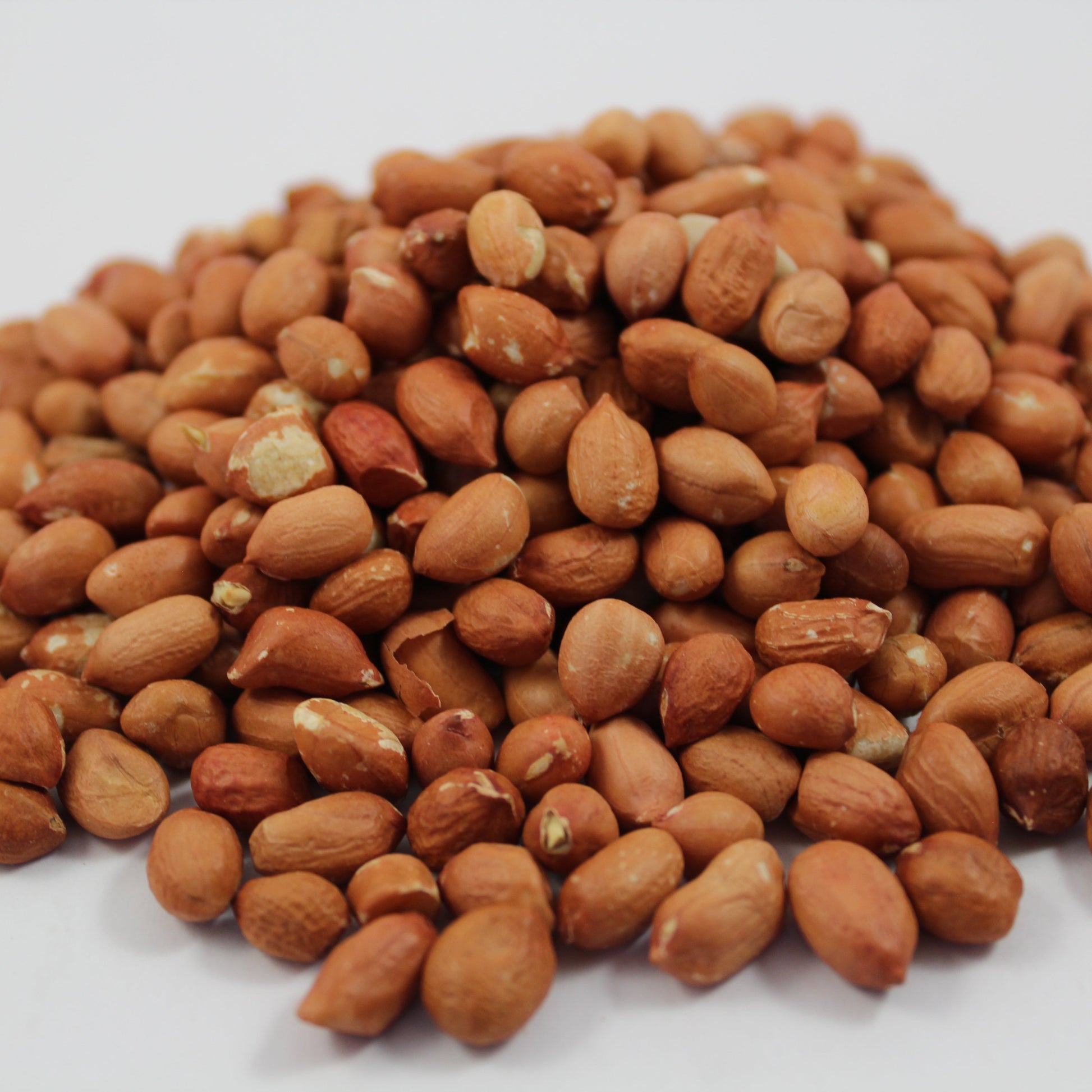 raw peanuts with red skin